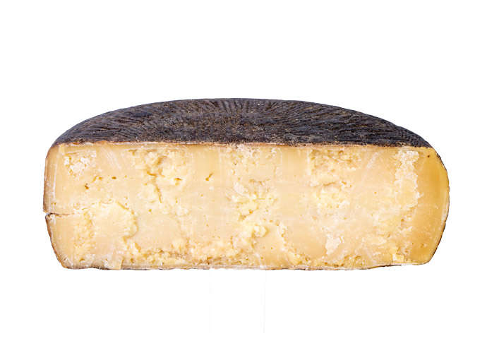 Formaggio di pecora siciliano pepato in crosta